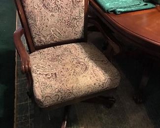 Claw foot and arm dining chair on wheels