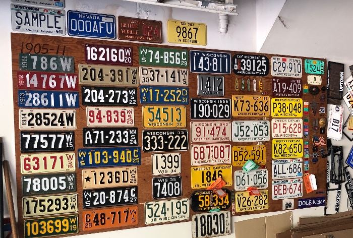 This wall consists of plates dating from 1911-1988. This selection will be a special bid item. Many other plates are for sale individually.