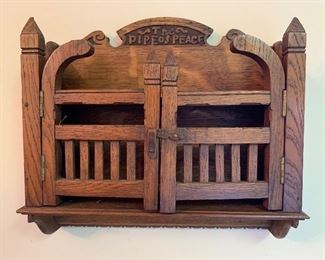 Pipe rack -carved "The Pipe of Peace"