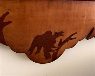 Detail from pair of carved mirrors