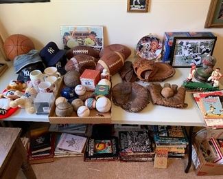 Baseballs; gloves, mitts, footballs, 1960s basketball, softballs, Yankees; assorted books under