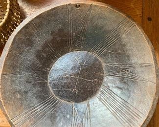 Carved wooden bowl with compass rose