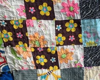 C. 1970s quilt with polyester squares in funky patterns