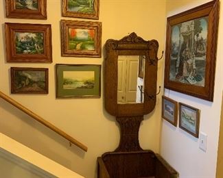 Victorian hall bench with coat rack. In picture two of the racks are missing. These are inside the bench.
