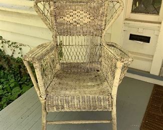 Heavy Old Wicker Chair with Magazine Holder Sides