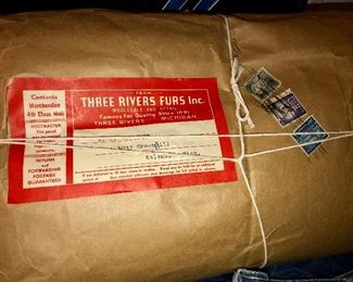 Unopened rolls of leather from Three Rivers Furs