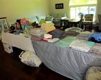 Linens, towels, designer clothes and hand bags