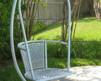 One of two poolside chairs