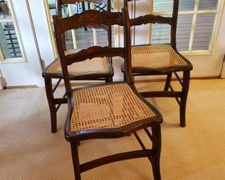 Set of four cane seat chairs