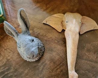 Carved wooden elephant and a rabbit wall decor