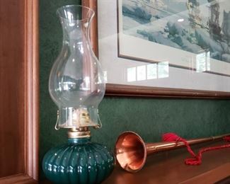 Antique green glass oil lamp and brass and copper horn
