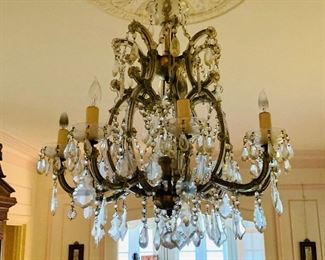 $1,800 Brass and crystal chandelier. 34"H x 28"W