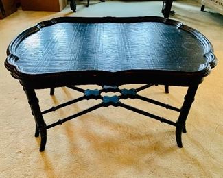 $250 Ethan Allen black painted cocktail table with flower motif top ; 36" W x 19" H x 25.5" D 