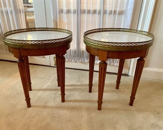 $250 Pair of small  marble top oval tables with . One marked "Danby".  18"H x 15"W x 12.5"D