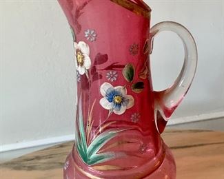 $100 Murano rose colored glass pitcher with painted flowers.  13"H