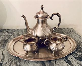 TO BE PRCED Norwegian 830 Silver tea pot, creamer and sugar.  Tray marked "Germany". Tea pot 10.5"H, creamer 3.5"H, sugar bowl 3.25"H, tray 18"W x 12"D Tea set approx 980g