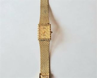 $45; Calinda gold tone vintage wristwatch ; 7" band  