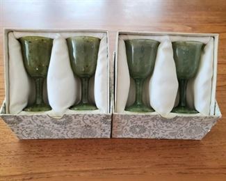$40 Four carved stone cordial glasses ; 3.5" tall 
