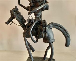 $200 Small metal statue (front)