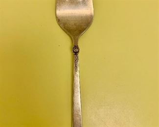 $75; Sterling serving  fork.  Approx 93g