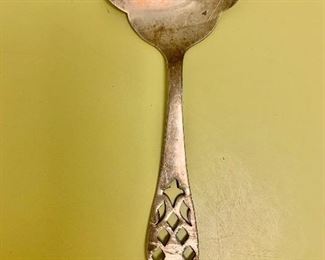 $20; Sterling crumb catcher.  Shreve & Co; approx 19 g