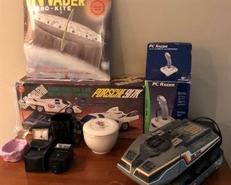 Vintage toys throughout the house (emphasis on 1980s); Porsche 917K radio control car; Big Trak programmable electric vehicle.