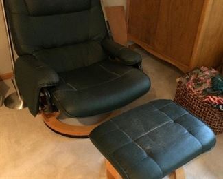 Ekorne or Ekorne-style stressless recliner with ottoman.