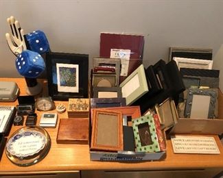 Many picture frames, clocks and other tabletop accessories.