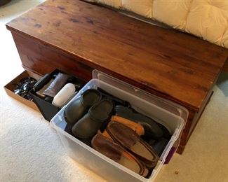 Lots of men’s shoes, sunglasses, reading glasses, and cases.