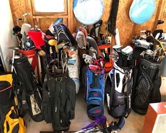Multiple golf bags and high-end clubs by Ping, TaylorMade, Callaway, and more.