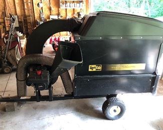 Agri-Fab tow behind lawn vacuum.