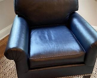 Navy leather chair with nail heads.  A little interesting in the cushion which actually “kind of inhales and exhales “ when u sit down and get up.  Perfect condition   32 x32 x 34 h.  $375