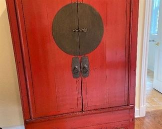 Beautiful red decorative cabinet.  Next pictures show the inside.  43w x 69h x 23 deep.  $900.  This is great 