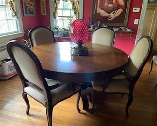 French mahogany round pedestal table with multiple leaves sits 14. 6 dining room arm chairs