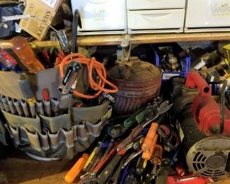 Assortment of hand tools (Work table full of tools)