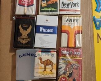 Lots of old packs of cigarettes