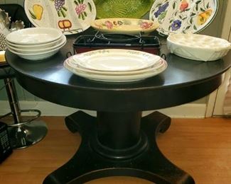 Round kitchen table (heavy base), platters (including Pfaltzgraff), serving bowls, and more.
