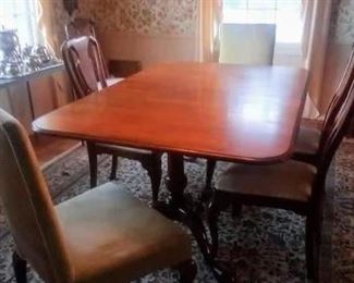 Baker table and 6 chairs by Henredon.
