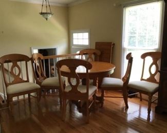 Beautiful table with 6 chairs and extension.