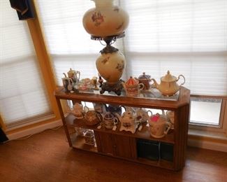 Globe lamp, tea pots and sofa table