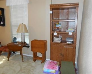 bookcase, TV trays, fold down table, lamp, camel chair, blankets, kids books, etc.