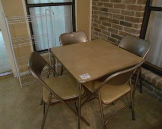 card table set with four chairs 