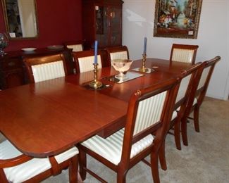 formal  Diningroom set with 4 inserts and eight chairs