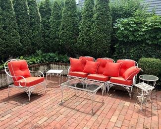 White wrought iron couch, chair, coffee table. 
3 end tables 