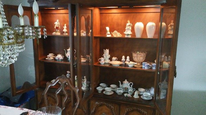Finest Hand Carved Hardwood French Ambassadors style Lighted China Cabinet or Closet.
Loaded with European & Asian Porcelains and Lenox and Crystal!