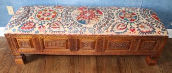 Carved wood bench made in Mexico