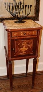 Inlaid marble top cabinet