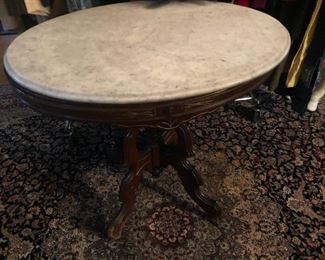 round table with marble top