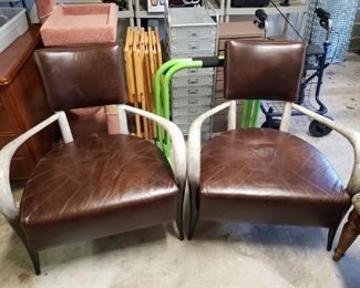 Google these-- Very Rare pair Bernhardt Elka  Faux Longhorn and Leather Chairs. Excellent Condition. A steal at $1,200 for the pair