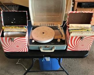 Vintage record player and two cases of vintage 45’s